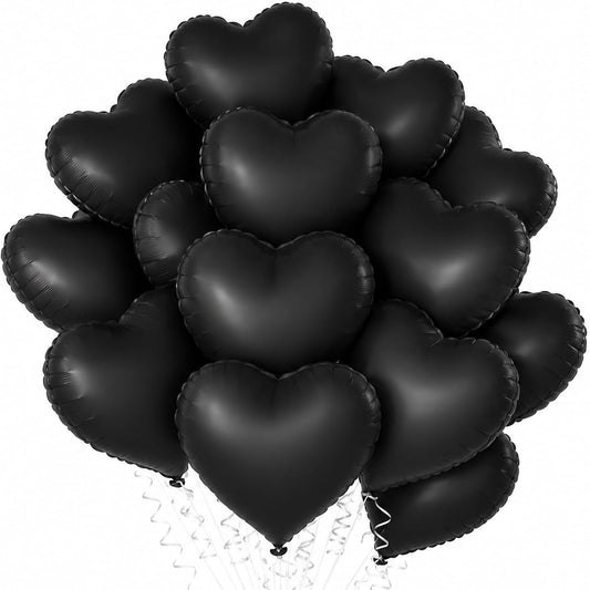 A cluster of black heart-shaped foil balloons tied together with clear string, photographed against a plain white background.