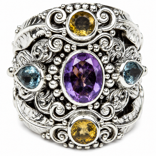 An ornate sterling silver ring featuring a large oval purple amethyst center stone, flanked by two marquise-cut light blue sapphires and two oval yellow citrines, set against a white background.